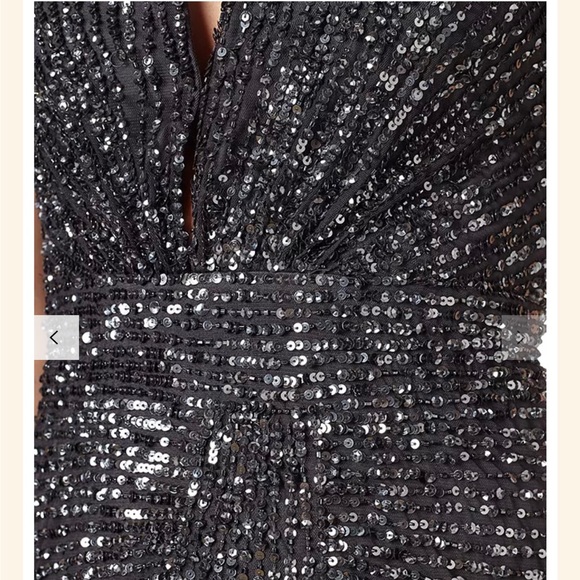 Adrianna Papell Halterneck
Fully Beaded Gown. - Picture 4 of 9